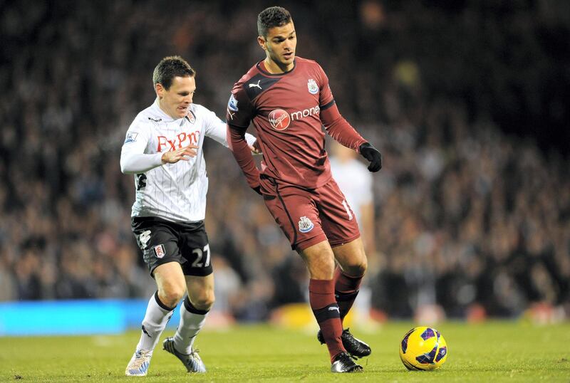 Fulham's Sascha Riether (left) and Newcastle United's Hatem Ben Arfa battle for the ball   (Photo by Joe Giddens - PA Images via Getty Images)