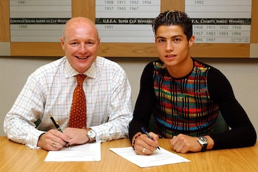 Cristiano Ronaldo signs for Manchester United at Old Trafford on August 12, 2003. Getty