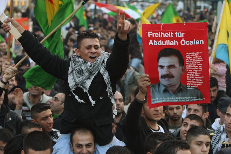 A man holds a sign demanding freedom for imprisoned Kurdish leader Abdullah Ocalan at a protest of mostly Kurdish demonstrators on November 4, 2007, in Berlin, Germany. Getty Images