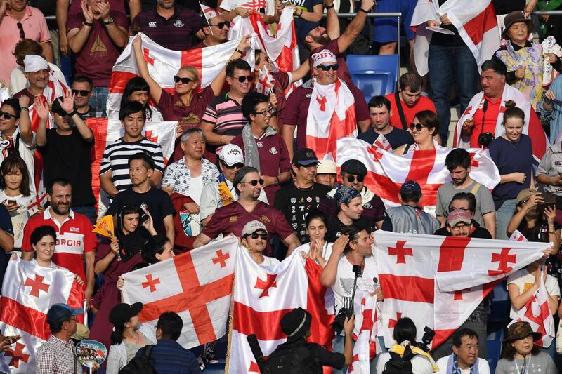 Georgia supporters celebrate  after their team beat Uruguay at the Kumagaya Rugby Stadium on Sunday. AFP