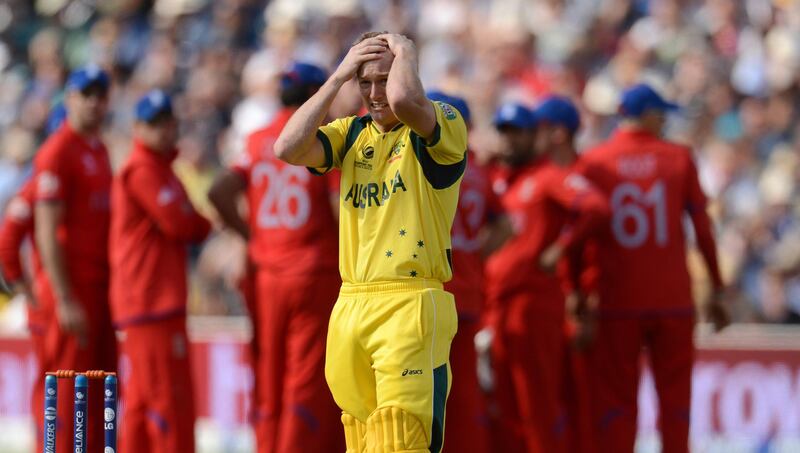 Australia's captain George Bailey wipes his face after the dismissal of teammate Adam Voges during the ICC Champions Trophy group A match against England at Edgbaston cricket ground in Birmingham June 8, 2013. REUTERS/Philip Brown (BRITAIN - Tags: SPORT CRICKET) *** Local Caption ***  PB26_CRICKET-CHAMPI_0608_11.JPG