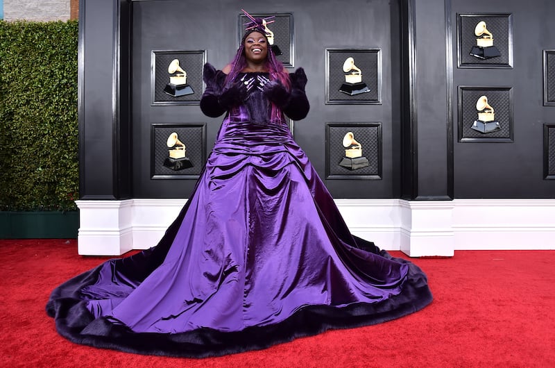 Yola, wearing a purple gown. AP