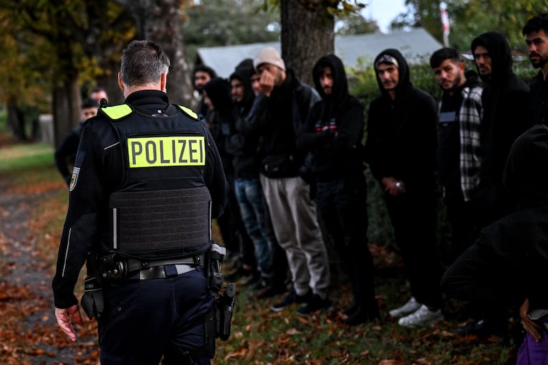 Migrants after being detained by German police in Forst, Germany. EPA