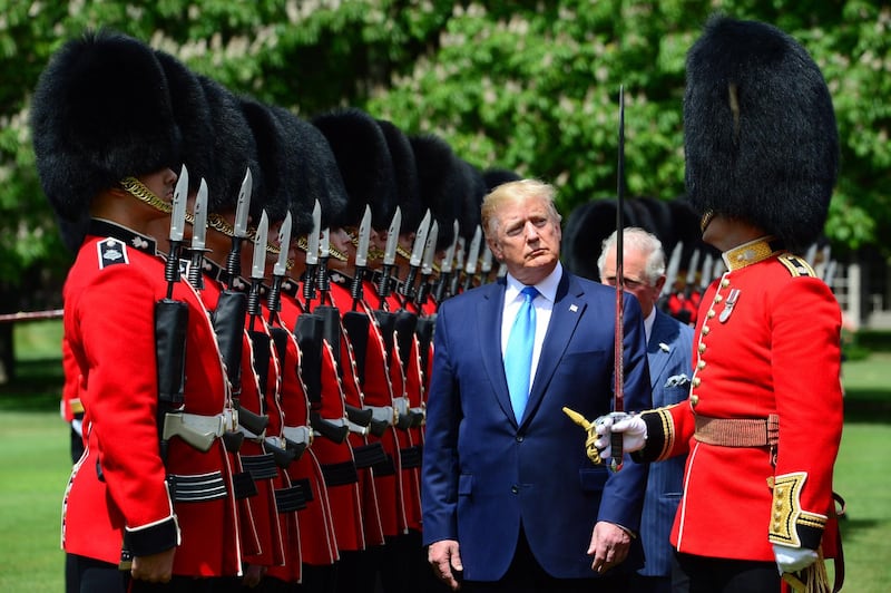 US President Donald Trump (C), Britain's Charles (2-R), The Prince of Wales and Captain of the Guard Major Hamish Hardy (R) inspecting the Guard of Honour of the British Army's Household Division during the Ceremonial Welcome at Buckingham Palace, in London, Britain.  EPA