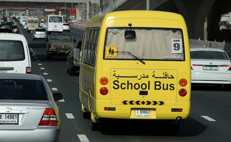 DUBAI, UNITED ARAB EMIRATES – Feb 18: School bus on Sheikh Zayed Road in Dubai. (Pawan Singh / The National) *** Local Caption ***  PS02-SCHOOL BUS.jpgOP05AP_SCHOOL BUS.jpg