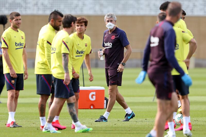 Barcelona manager Quique Setien oversees a training session. Getty Images