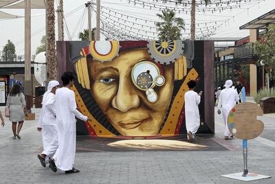 DUBAI , UNITED ARAB EMIRATES , MARCH 1  – 2018 :- People taking photos of 3D art work by Shawn McCann artist from USA on the first day of Dubai Canvas held at La Mer in Dubai. ( Pawan Singh / The National ) For Standalone / Big Picture