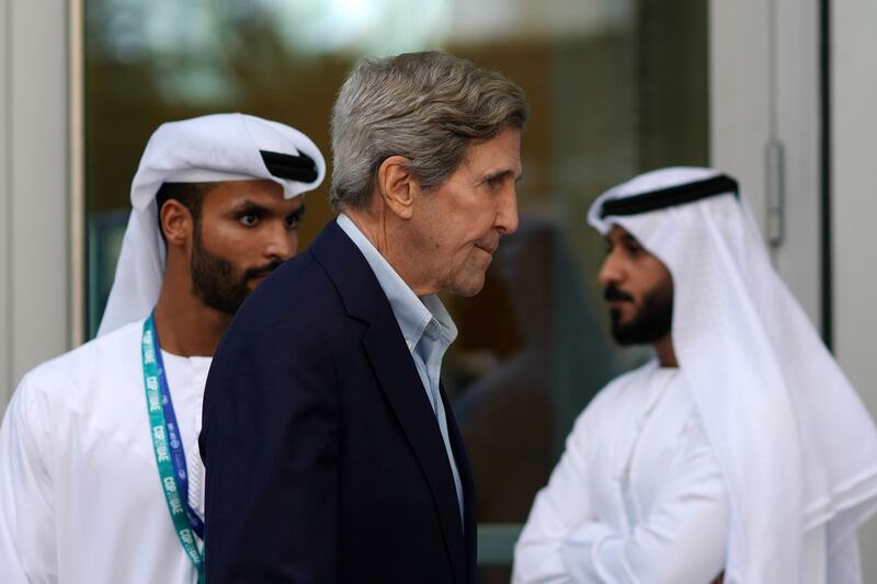 US climate envoy John Kerry arrives for the Cop28 summit in Dubai. AP