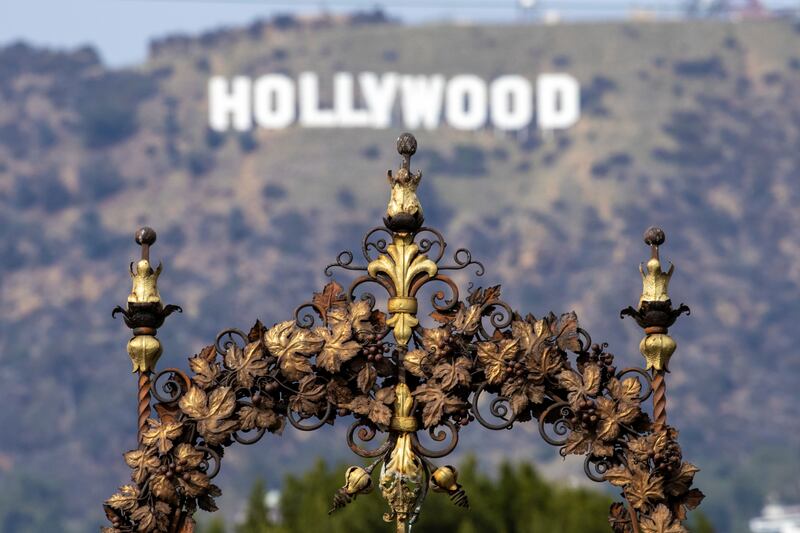 The Hollywood sign is visible above the Hollywood Forever cemetery entrance. Photo: Reuters