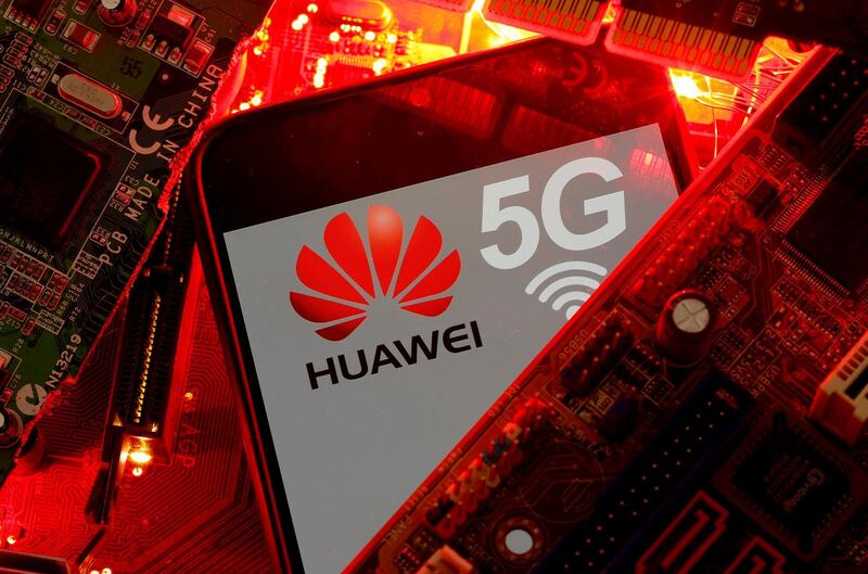 FILE PHOTO: A smartphone with the Huawei and 5G network logo is seen on a PC motherboard in this illustration picture taken January 29, 2020. REUTERS/Dado Ruvic/File Photo