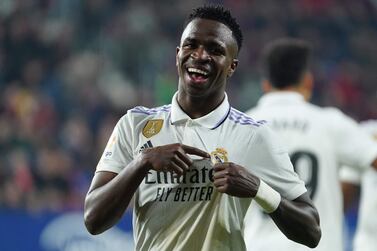 Real Madrid's Brazilian forward Vinicius Junior celebrates after scoring a goal that was later annuled during the Spanish League football match between CA Osasuna and Real Madrid CF at El Sadar stadium in Pamplona, on February 18, 2023.  (Photo by CESAR MANSO  /  AFP)