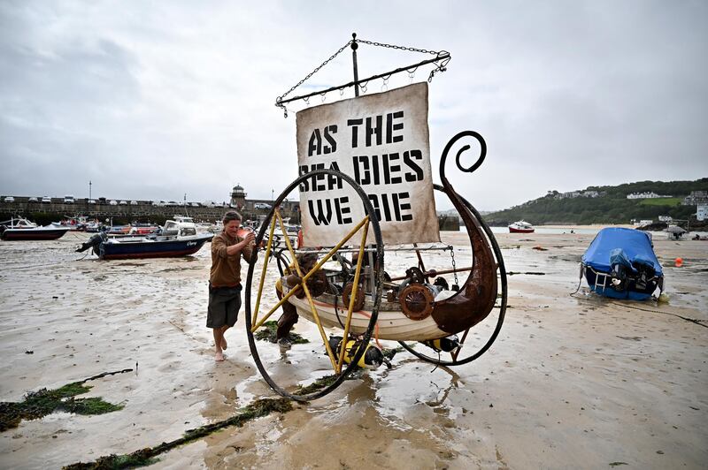 Extinction Rebellion stage a protest on the beach of St Ives. Getty Images