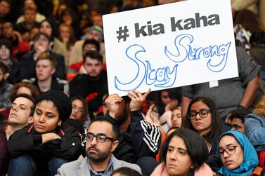 A man holds a play card at a vigil held at NYU Kimmel Center to mourn for the victims of the Christchurch mosque attack in New Zealand, Manhattan, in New York City, New York, U.S. March 15, 2019. REUTERS/Rashid Umar Abbasi