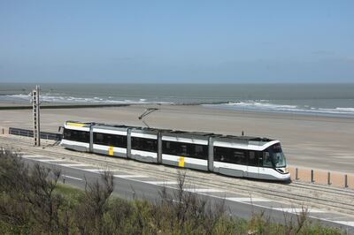 The coastal tram offers views of seaside towns and dune-filled landscapes. Photo: John Brunton 