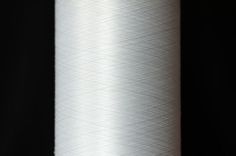 A sample of the greenspun yarn, which is used to make clothing items.