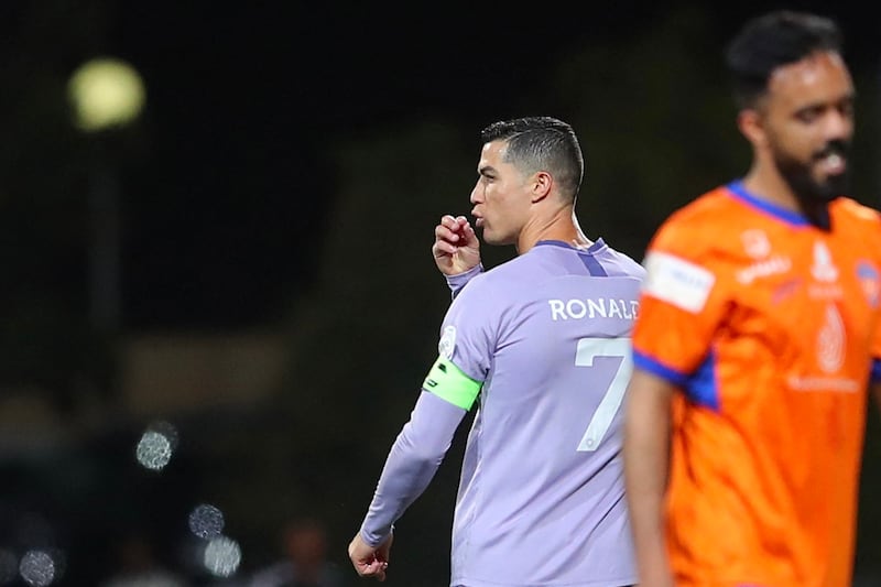 Nassr's Portuguese forward Cristiano Ronaldo gestures at the end of the Saudi Pro League football match between Al-Fayha and Al-Nassr at the al-Majmaah stadium in the city of al-Majmaah on April 9, 2023.  (Photo by Abdulaziz ALNOMAN  /  AFP)