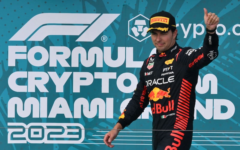 Red Bull's Mexican driver Sergio Perez on the podium after finishing second in Miami. AFP