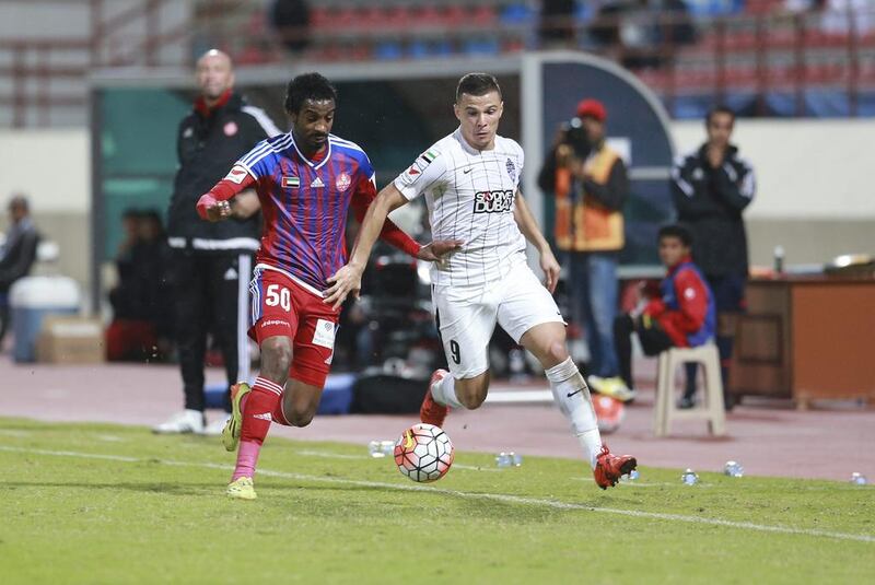 Rodrigo Lima, right, scored in the third minute of Al Ahli’s 4-1 away victory over Al Shaab at Sharjah last night to take his league tally to 11 goals. Hasan Al Raesi / Al Ittihad