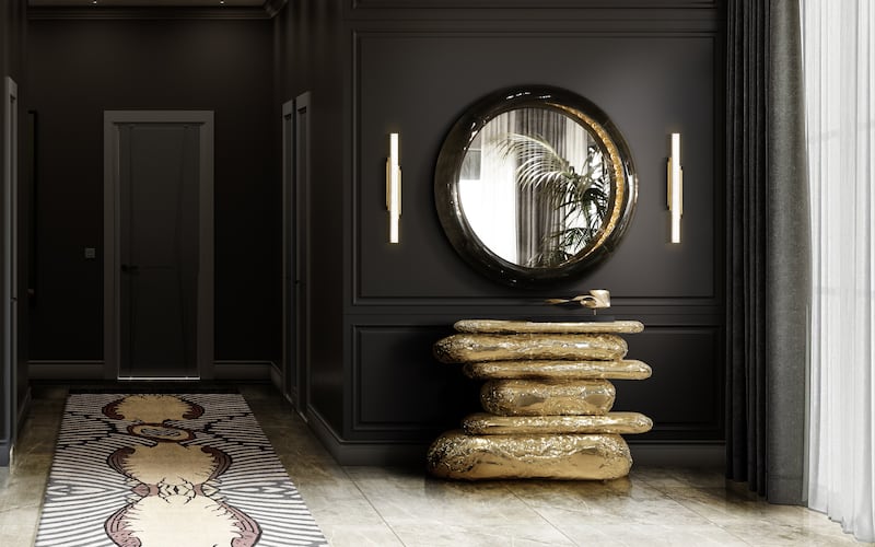 Look to asymmetrical accessories and simple yet sculptural wall lights. Photo: Covet House