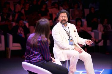 Iraqi National Symphony Orchestra director Karim Wasfi speaks on a panel about using the arts to combat extremism at Abu Dhabi's CultureSummit 2018