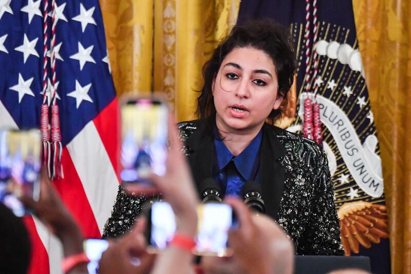 Pakistani vocalist and composer Arooj Aftab speaks during an Eid Al Fitr reception in the East Room of the White House in Washington. AFP