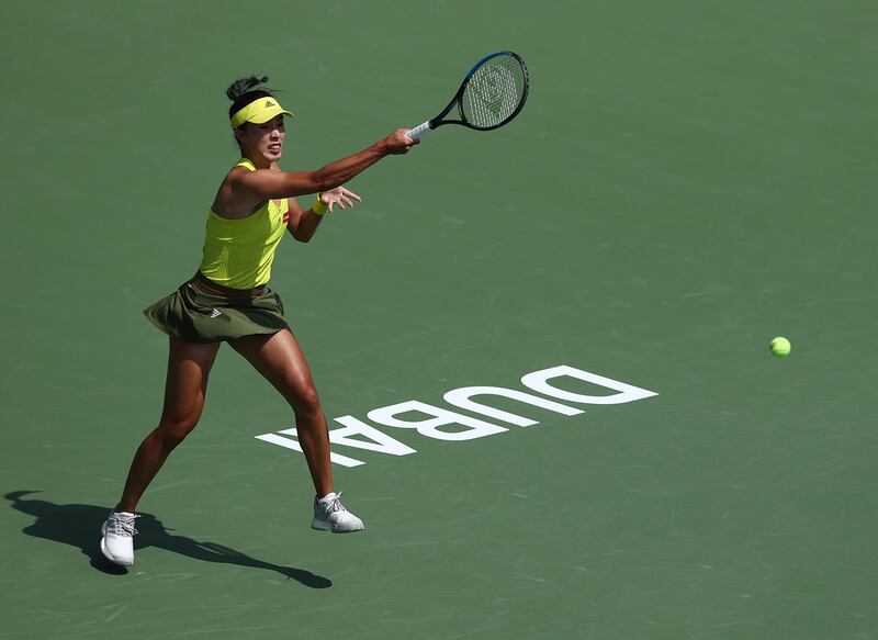 DUBAI, UNITED ARAB EMIRATES - MARCH 07:  Qiang Wang of China plays a forehand in her women's singles match against Svetlana Kuznetsova of Russia during Day One of the Dubai Duty Free Tennis at Dubai Duty Free Tennis Stadium on March 07, 2021 in Dubai, United Arab Emirates. (Photo by Francois Nel/Getty Images)
