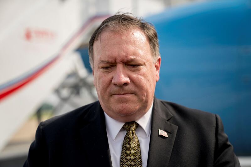 FILE PHOTO: U.S. Secretary of State Mike Pompeo pauses while speaking to members of the media following two days of meetings with Kim Yong Chol, a North Korean senior ruling party official and former intelligence chief, before boarding his plane at Sunan International Airport in Pyongyang, North Korea, July 7, 2018. Andrew Harnik/Pool/File Photo via REUTERS