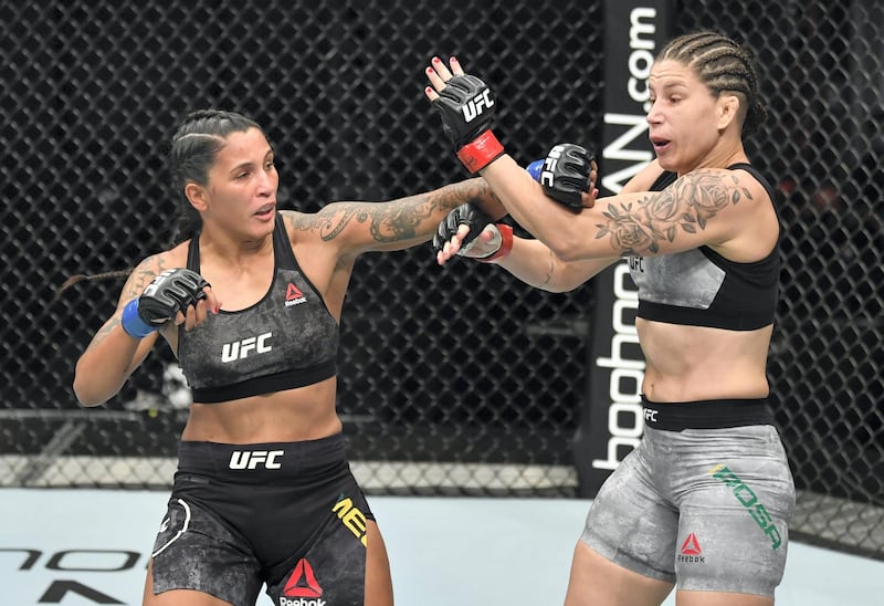 ABU DHABI, UNITED ARAB EMIRATES - JULY 12: (L-R) Vanessa Melo of Brazil punches Karol Rosa of Brazil in their bantamweight fight during the UFC 251 event at Flash Forum on UFC Fight Island on July 12, 2020 on Yas Island, Abu Dhabi, United Arab Emirates. (Photo by Jeff Bottari/Zuffa LLC)
