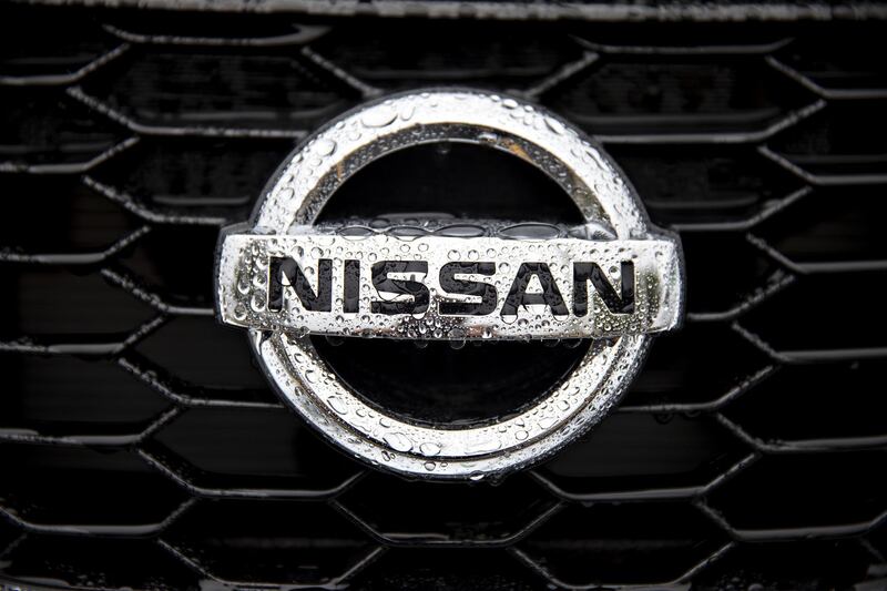 A Nissan Motor Co. badge is seen on the grill of a vehicle at a car dealership in Joliet, Illinois, U.S., on Wednesday, Oct. 2, 2019. Auto sales in the U.S. probably took a big step back in September, setting the stage for hefty incentive spending by carmakers struggling to clear old models from dealers' inventory. Photographer: Daniel Acker/Bloomberg