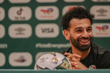 Egypt's captain Mohamed Salah speaks during the pre-match press conference in Garoua on January 10, 2022.  (Photo by Daniel Beloumou Olomo  /  AFP)