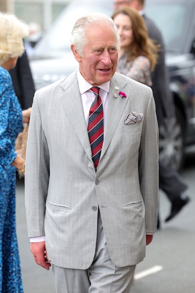 The royal displays his experimental approach to accessories. Photo: Reuters