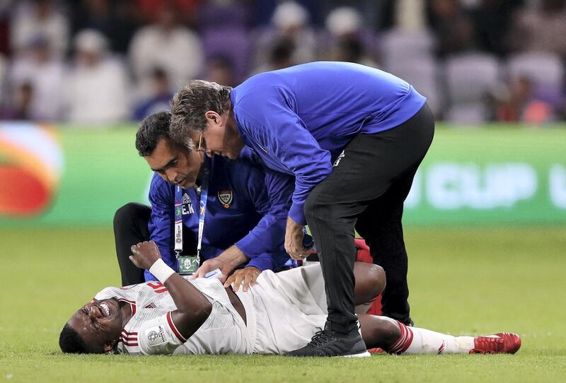 Al Ain, United Arab Emirates - January 14, 2019: Capt Ismail Al Hammadi of UAE goes down injured during the game between UAE and Thailand in the Asian Cup 2019. Monday, January 14th, 2019 at Hazza Bin Zayed Stadium, Al Ain. Chris Whiteoak/The National