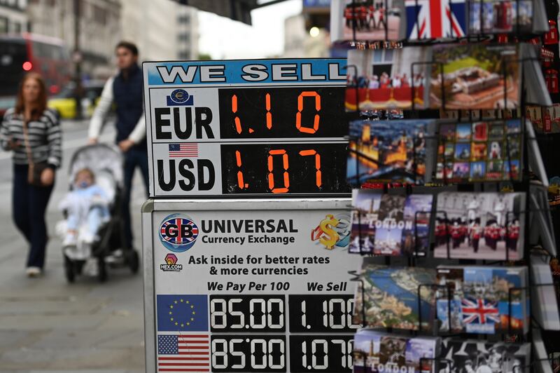 A currency board in London. The FTSE 100 fell sharply at the opening on Wednesday. EPA