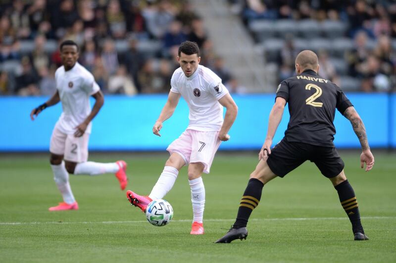 Inter Miami midfielder Lewis Morgan  passes the ball. Reuters