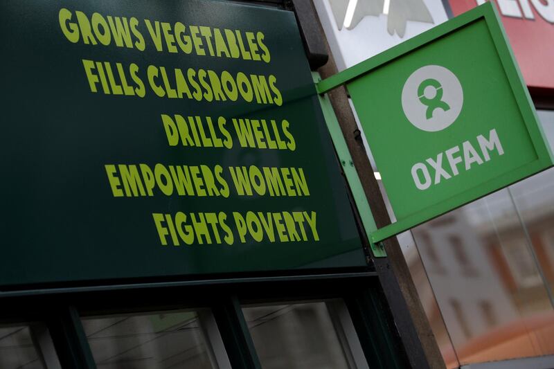 A sign is seen above a branch of Oxfam, in London, Britain February 12, 2018.   REUTERS/Peter Nicholls