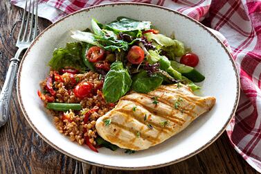 Omad dieters have to ensure they get all the nutrients in the requisite amounts, and not binge on high-sugar processed foods. Seen here, chicken breast with bulgur tabbouleh and a green salad. Getty Images 