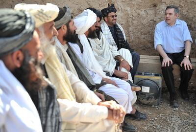 Gordon Brown with Afghan village elders at Forward Operating Base Shawqat during his 2010 trip to the Afghanistan. Getty Images