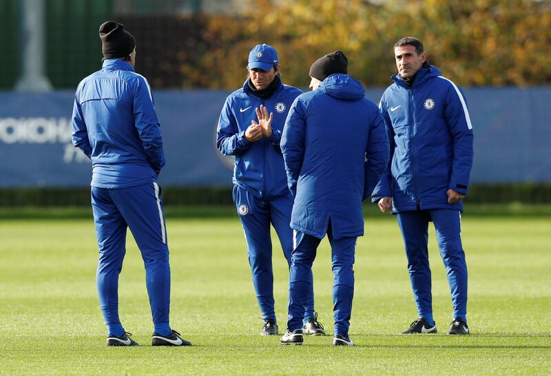 Chelsea manager Antonio Conte, centre, talks to his coaches during training. John Sibley / Reuters