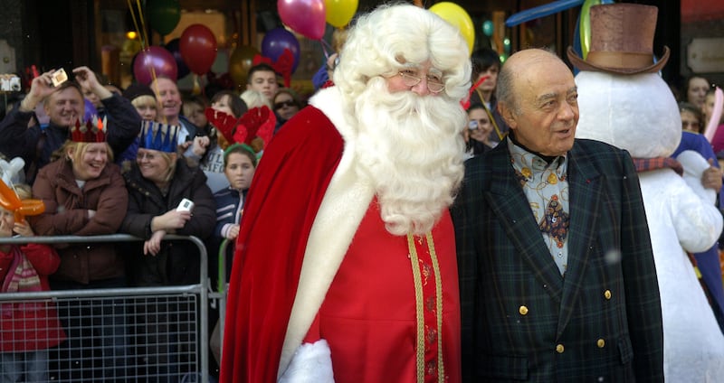 Mr Al-Fayed and Santa Claus at Harrods in 2007. Getty Images