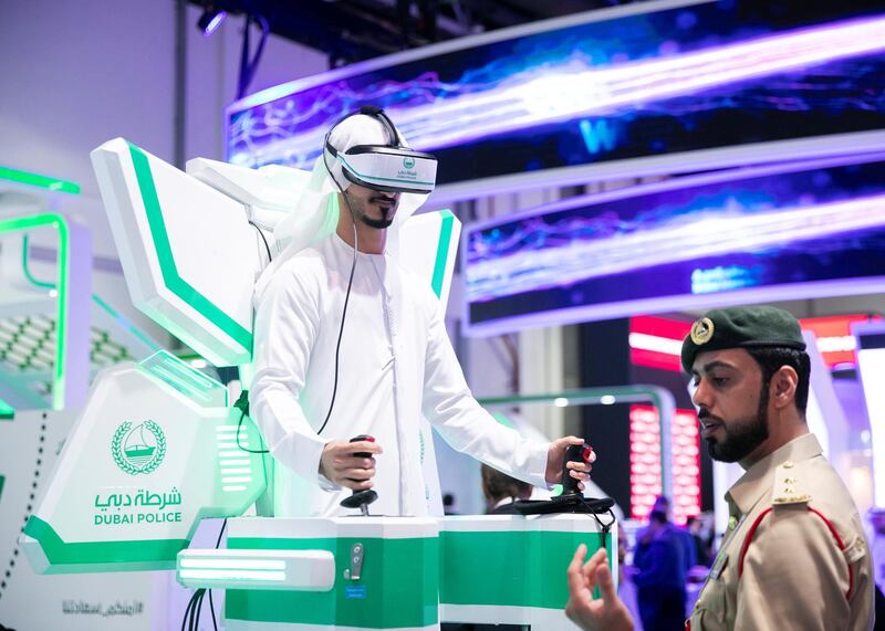 DUBAI, UNITED ARAB EMIRATES. 06 OCTOBER 2019. 
A man plays a virtual game at Dubai Police’s booth during Gitex Technology Week at Dubai World Trade Center.

(Photo: Reem Mohammed/The National)

Reporter:
Section: