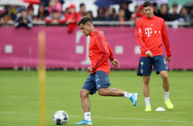 Coutinho and Lewandowski are seen during a training session. Getty Images