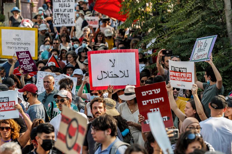 Protesters rally against Israeli settlement activity in Sheikh Jarrah, occupied East Jerusalem, on July 30. AFP