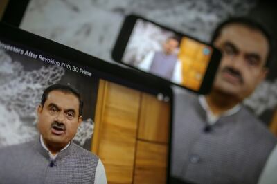 Billionaire Gautam Adani during a video speech on monitors in Mumbai, India, on Thursday. Bloomberg