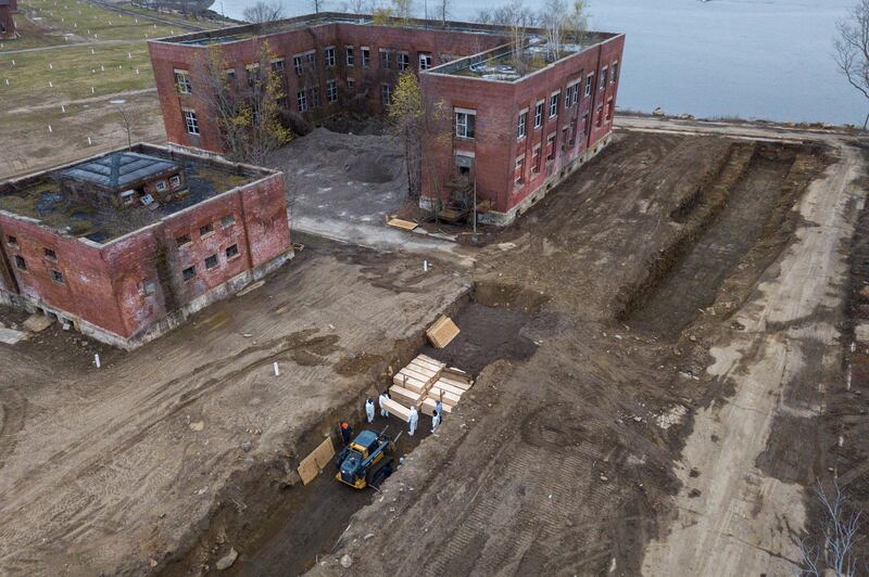 Drone pictures show bodies being buried on New York's Hart Island where the department of corrections is dealing with more burials overall, amid the coronavirus disease (COVID-19) outbreak in New York City, U.S., April 9, 2020. REUTERS/Lucas Jackson