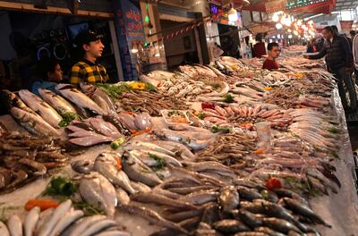 An Egyptian fishmonger in the coastal city of Port Said, north-east of Cairo. Reuters