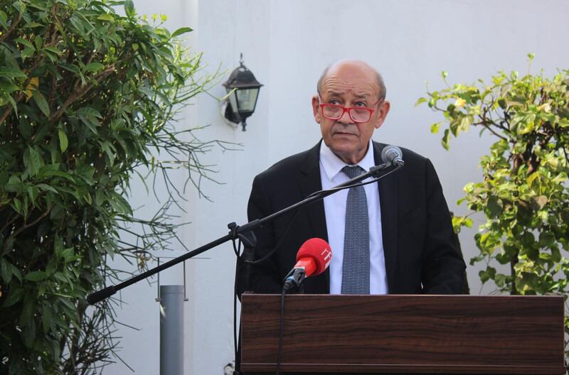 French Foreign Affairs Minister Jean-Yves Le Drian speaks at the inauguration of a French diplomatic office in Banjul on November 5, 2018.  / AFP / Clare Bargeles
