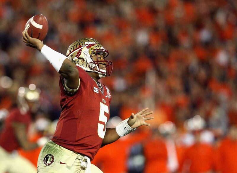 Jameis Winston won the Heisman Trophy this year as college football's best player. Stephen Dunn / Getty Images/ AFP