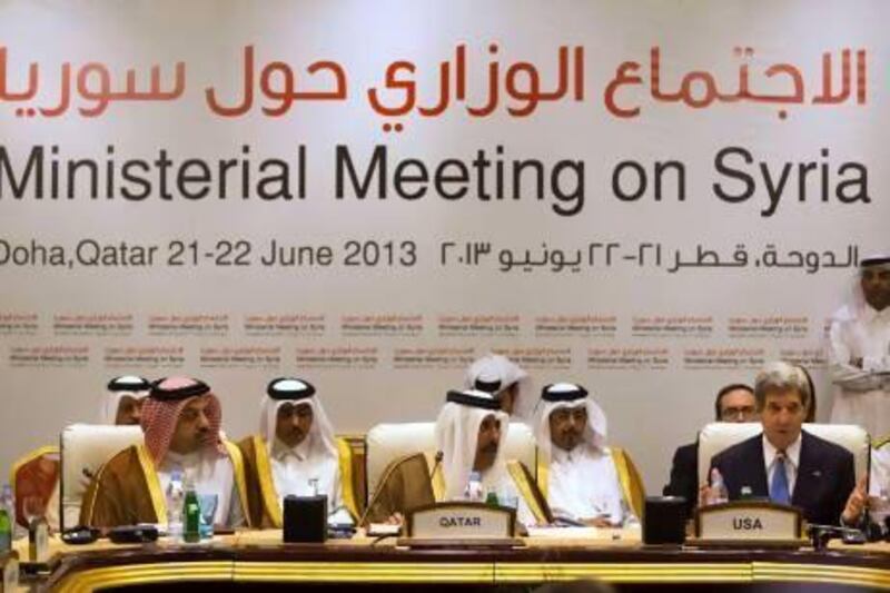 Qatari Foreign Minister Hamad bin Jassim Al Thani and US Secretary of State John Kerry were among the representatives at Saturday's Friends of Syria meeting.