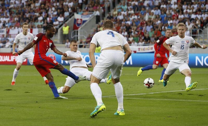 England’s Raheem Sterling shoots at goal against Slovakia in the European World Cup qualifying match. Carl Recine / Action Images / Reuters