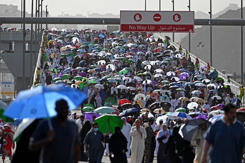Pilgrims arrive to perform the symbolic stoning of the devil ritual as part of the Hajj pilgrimage in Mina, near Saudi Arabia's holy city of Makkah. AFP